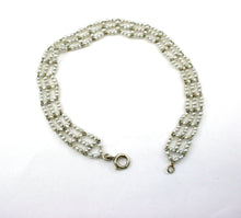 Load image into Gallery viewer, Rare French Edwardian Belle Époque Platinum Woven Seed Pearl Bracelet
